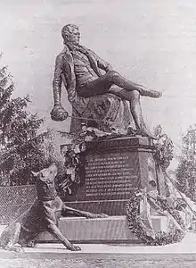 Mémorial au jeune Bismarck du Kösener Senioren-Convents-Verband à Rudelsburg (1896), qui est une statue Bismarck assis avec un chien à ses pieds