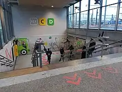 À la gare.