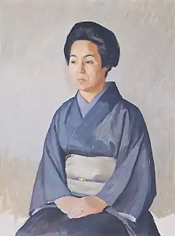 Peinture d'une femme assise en kimono