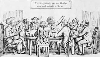 Une dizaine d'hommes, à l'évidence bourgeois, sont assis baillonnés autour d'une table. Au-dessus de la table sur panneau est écrit : « Combien de temps nous sera-il encore permis de penser? ».