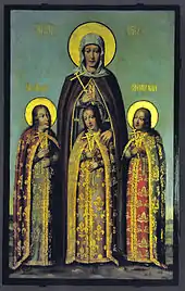 Trois jeunes filles côte-à-côte et leur mère derrière, auréolées et tenant une croix.