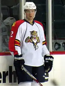 Photographie de Ballard avec le maillot blanc des Panthers.