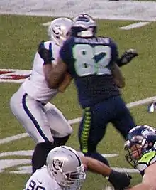 Description de l'image Kellen Winslow blocking a Raider.jpg.