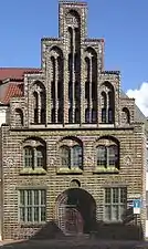 Une maison à Rostock, Allemagne, avec briques émaillées et céramique figurative