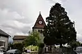 Vue de l'église, depuis le village de Bassins.