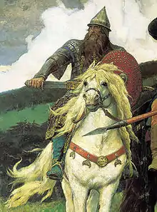 Vue d'un homme muni d'une épée et d'un bouclier sur un cheval blanc.