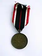 Dos de la médaille.