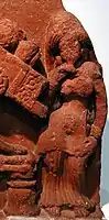 Plaque représentant une forme ancienne de long choli et gagra portée pendant l'empire Gupta