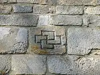 Double croix gammée sur le mur de l'église collégiale du XIIe siècle à Kruszwica.