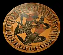 Coupe à lèvres : Thésée et le Minotaure, tondo d'un kylix attique à figures noires, vers -450/-440.