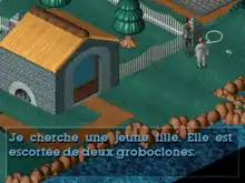 Capture d'écran où l'on voit Twinsen s'adresser à un personnage du jeu. Un cadre de texte, correspondant au dialogue, contient une phrase prononcée par Twinsen pour faire part de ses recherches concernant Zoé : « Je cherche une jeune fille. Elle est escortée de deux Groboclones ».