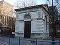 LNWR Portland stone entrance lodge.