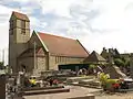 Église, détruite en 1944 et reconstruite après-guerre.