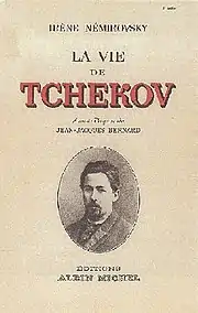 Couverture de livre beige avec caractère noirs et rouge pour le titre, et en médaillon photo d'homme jeune et brun