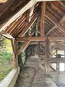 Photographie de l'intérieur du lavoir public du bourg.