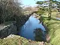 La canalisation de la rivière des marais par le canal des moines.