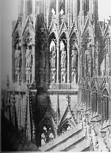 La galerie des rois à l'est de la tour sud-ouest de la cathédrale de Reims (1851).