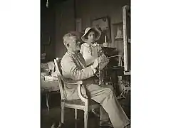 Le peintre et sa petite-fille.