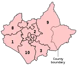 A map of a large county and an adjacent small county, to the east. The two counties are divided into a total of ten constituencies