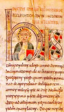 Page manuscrite avec le portrait d'un homme dans la boucle d'une grande lettre H
