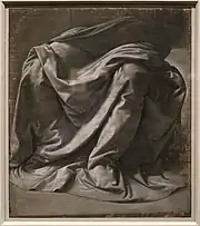 Dessin en noir et blanc représentant un drapé sur les jambes d'une figure assise.