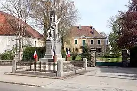 Le Poilu mourant en défendant le Drapeau (monument aux morts)