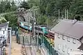 Un train Modalohr sortant du tunnel en direction de Modane.