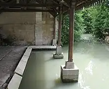 Le lavoir en bois découpé, à Ligueil sur l'Esves