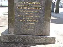 Indication de la limite de Wazemmes au croisement de la rue Gambetta et de la rue Solférino