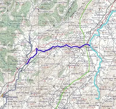 Carte représentant le tracé du canal en violet, et la ligne de partage des eaux (en vert) entre le bassin versant du Yangzi Jiang (à l'est) et celui de la rivière des Perles.