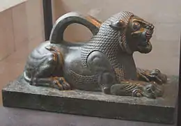 Poids en forme de lion, bronze.