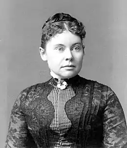 portrait de Lizzie Borden regardant légèrement vers la droite, en robe claire et les cheveux attachés.