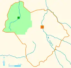 Vue d'une carte en couleur représentant le territoire d'une commune disparue.