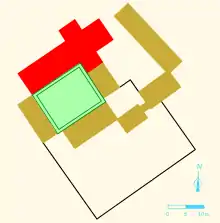 Plan en couleurs des bâtiments d'une abbaye, légende détaillée ci-dessous.