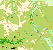 Vue d'une carte répartissant un territoire communal en grandes zones géologiques de couleurs différentes.