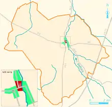 Vue d'une carte en couleur représentant les principales routes d'une commune ; en médaillon, le bourg agrandi.