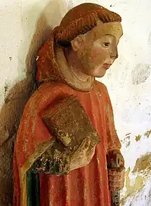 Statue de saint Laurent, kersanton polychrome de Roland Doré.