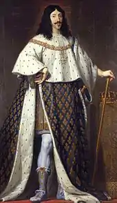 Portrait de Louis XIII en habits de sacre dont le manteau bleu fleurdelisé.