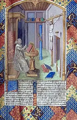 Page enluminée d'un manuscrit montrant un moine chartreux dans sa cellule contemplant un grand crucifix.
