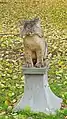 Statue de lynx dans le parc.