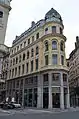Angle des rues Confort et Childebert : immeuble 2e moitié du XIXe siècle avec rotonde d'angle.