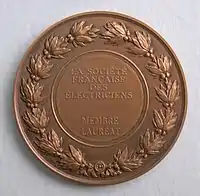 Médaille André-Marie Ampère (1775-1836). La société française des électriciens. Graveur Jules Chaplain (1839-1909). Revers.