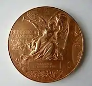 Médaille Exposition universelle de 1889. Décernée à Gaston Tissandier. Graveur Louis-Alexandre Bottée (1852-1940). Verso.