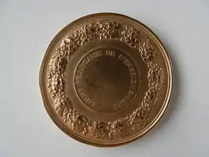 Ligue française de l'enseignement, médaille, revers.