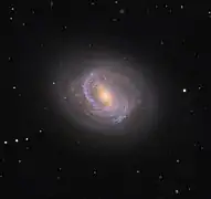 M58 en lumière visible par Adam Block (Observatoire du mont Lemmon/Université de l'Arizona).