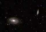 Vue combinées des deux galaxies M81 (en bas) et M82 (à droite).