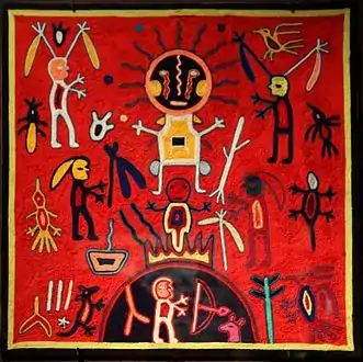 Tableau de laine nierika : La naissance du soleil. Bois, cire, laine, H. 60 cm. Indiens Huichol