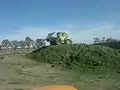 Compactage d'un ensilage en Australie (silo-taupinière), 2007.