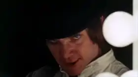 Malcolm McDowell dans le rôle d'Alex DeLarge.