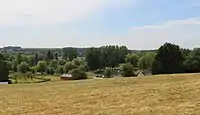 Vue de l'Étang des Sources depuis les hauteurs de l'église.